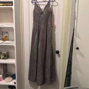 Lovely chrome (silver/pink) strappy dress for formal occasion. New & never worn!